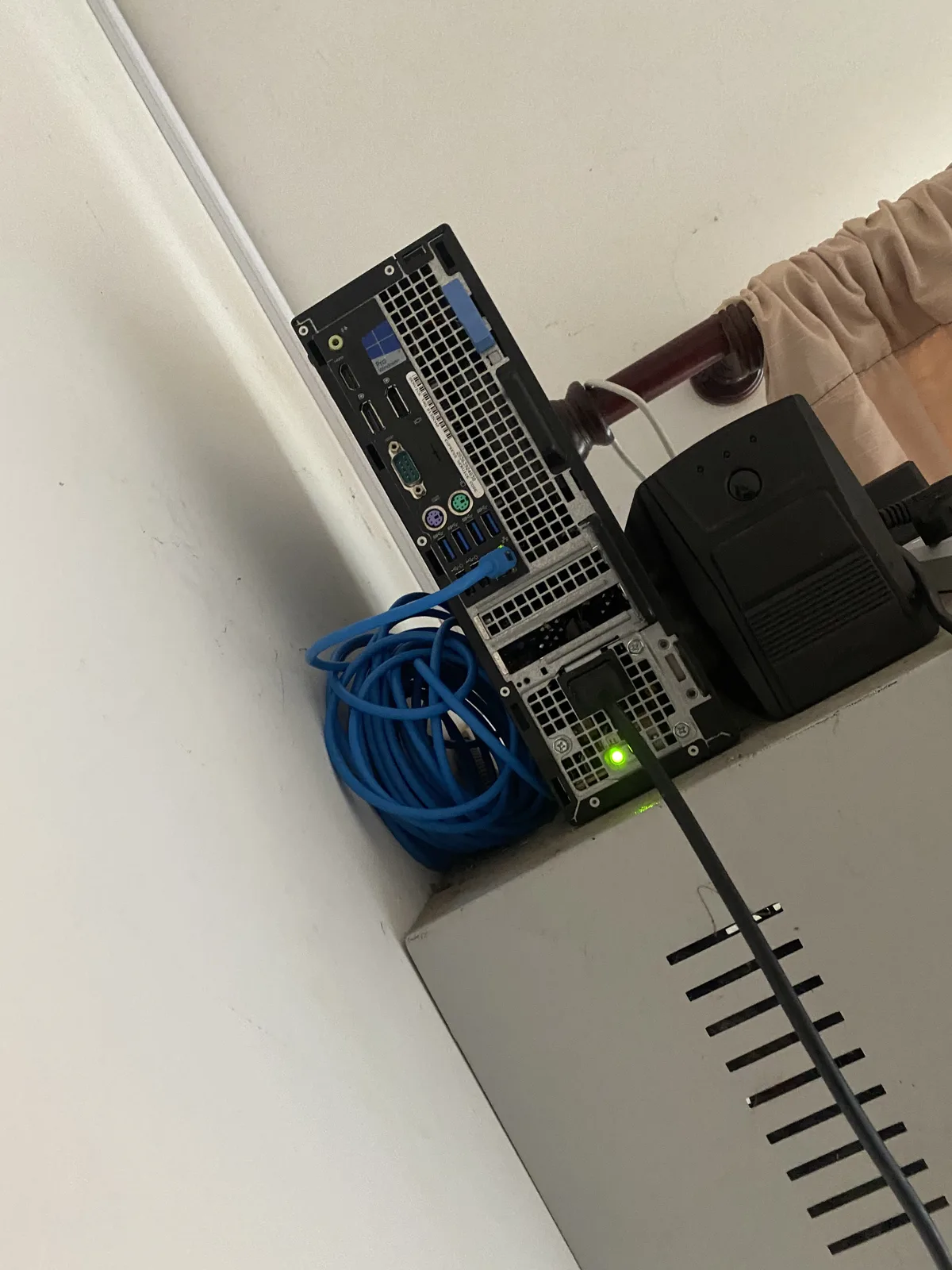 Close view of the home-lab node with Ethernet and power connections
